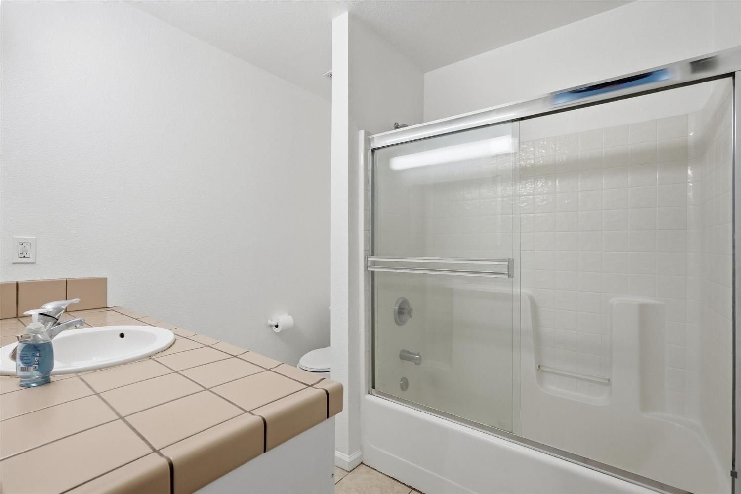 Before: original bathroom with the old bathtub