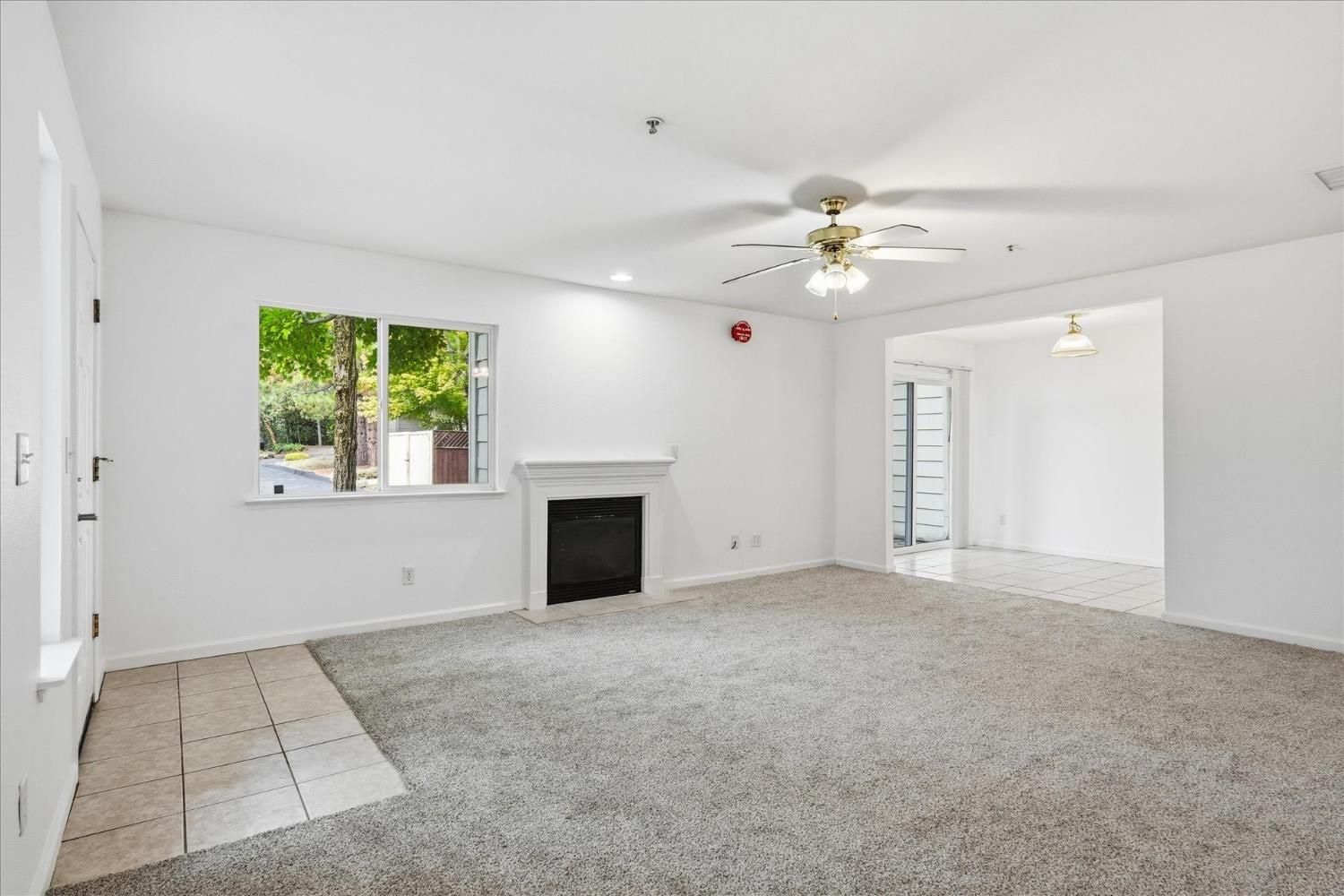 Before: empty living room ahead of the whole home remodel