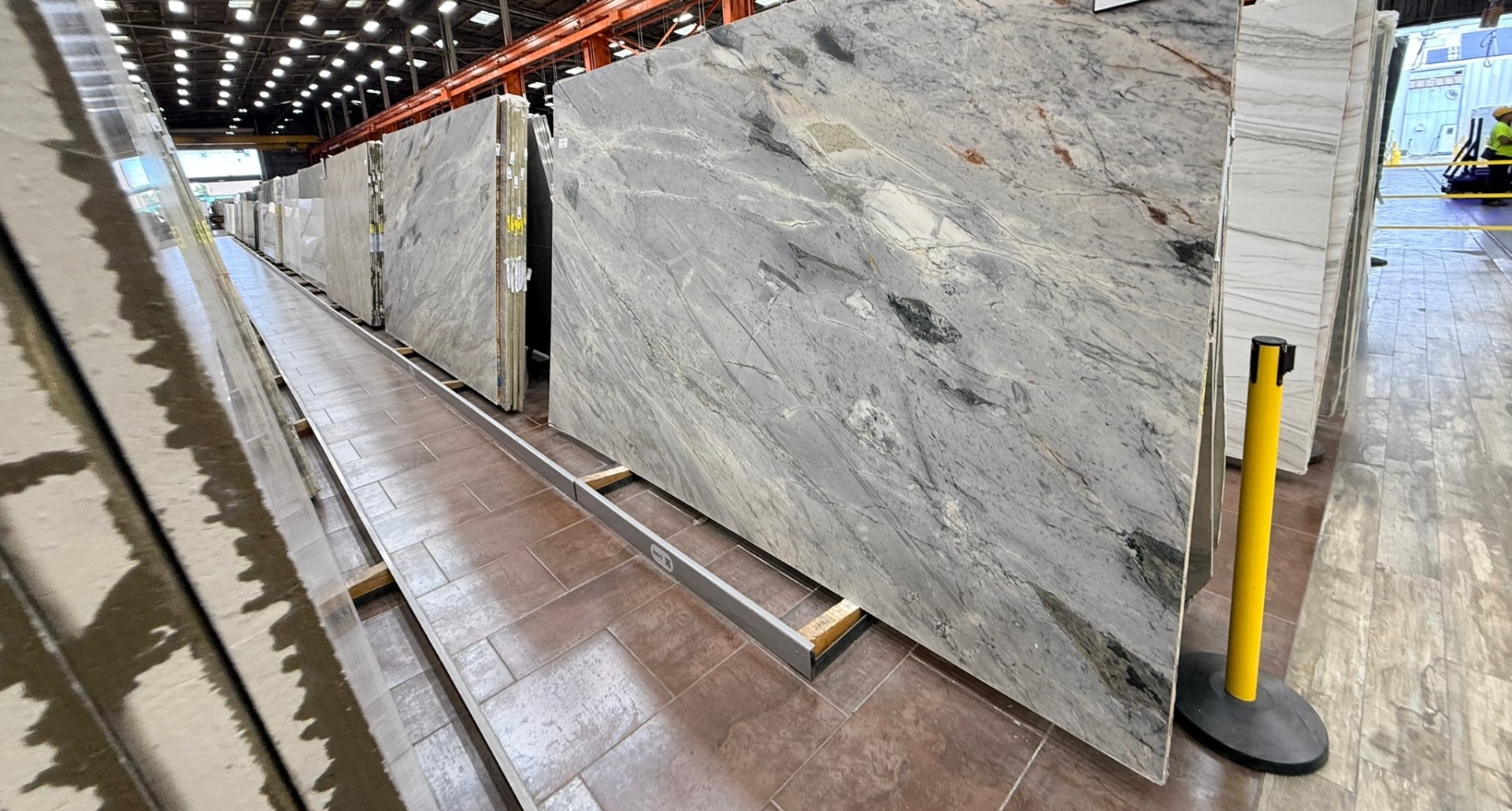 Premium gray-blue stone slab displayed in a professional slab yard