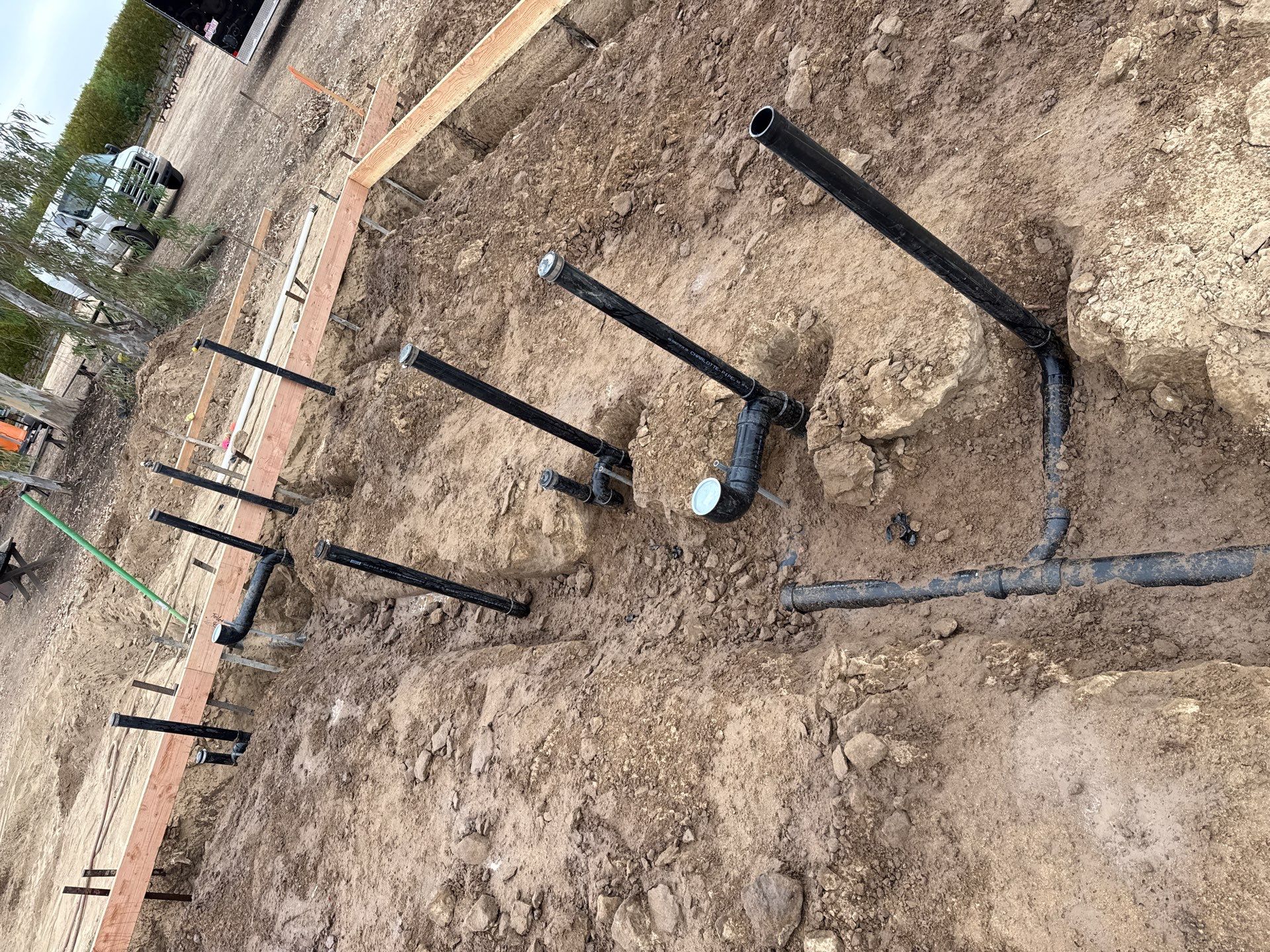 Underground plumbing rough-in ahead of the slab pour