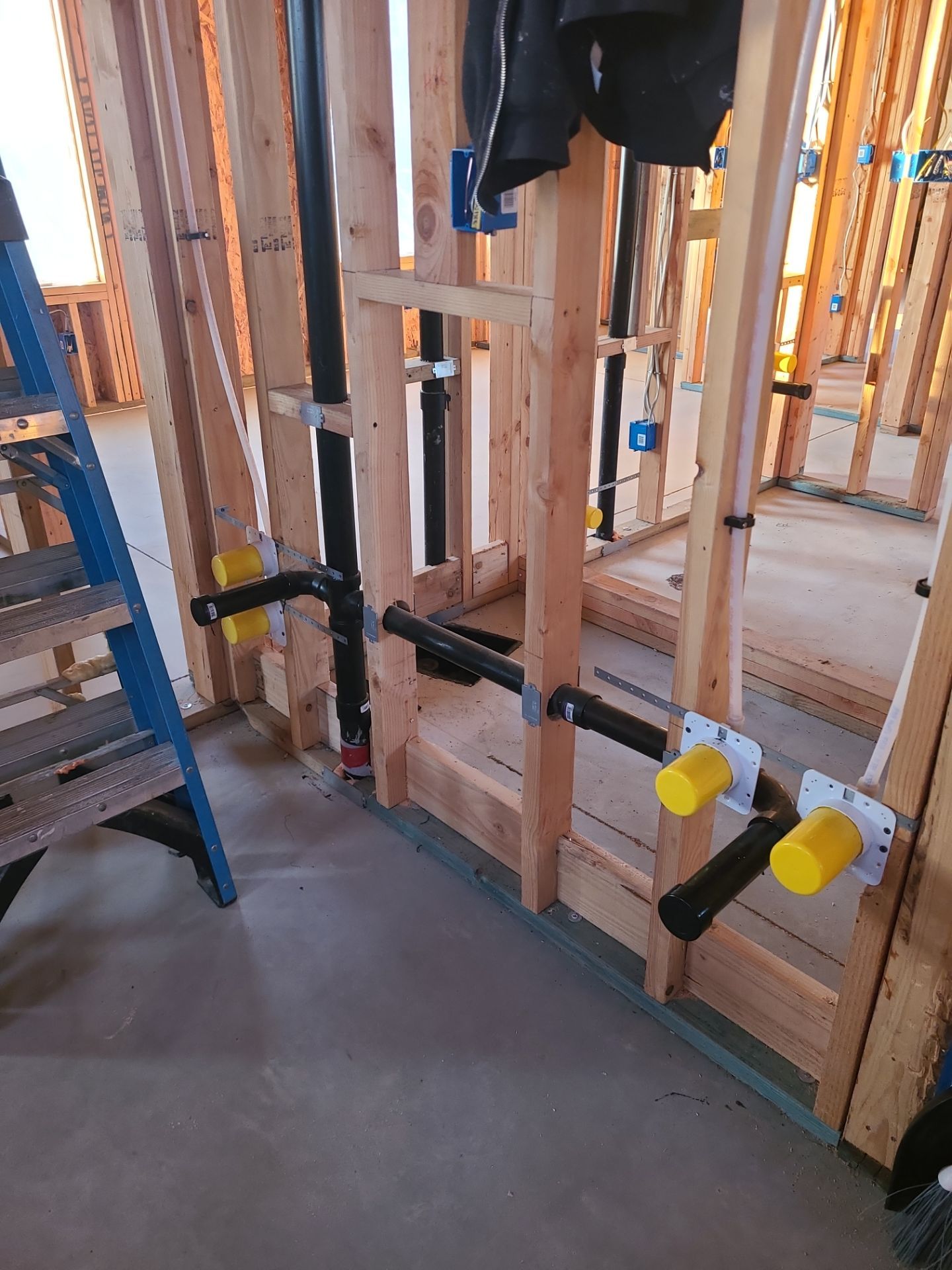 In-wall plumbing rough-in for a bathroom